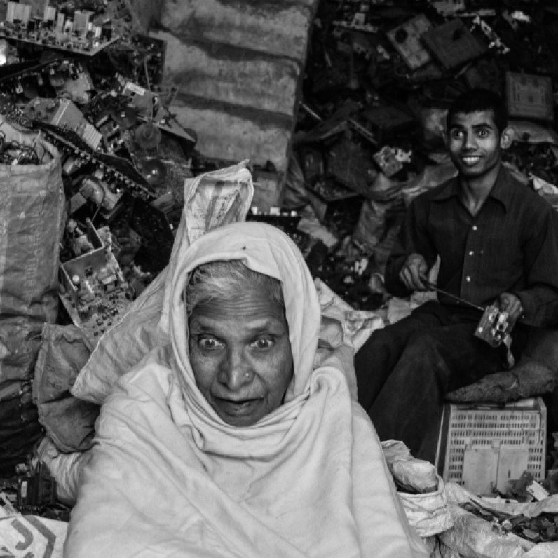 “My grandson is retarded. My daughter in law is a witch. I have told my son so many times to go for some other business. There is no profit in it, but who listens to me. Eh?” says Fahimda Khatoon, who is fed up after his grandson was born mentally challenged. She blames the computers for it. And the fumes around.